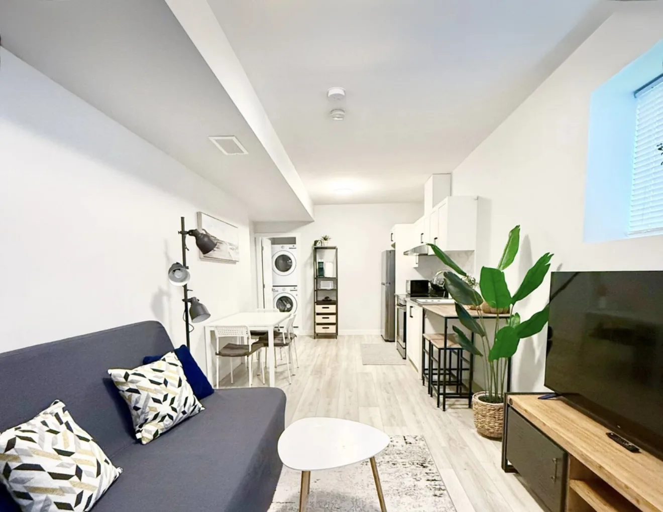 A bright open-plan guest suite